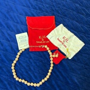 Kenneth Jay Lane pink pearl necklace and pearl stud earrings